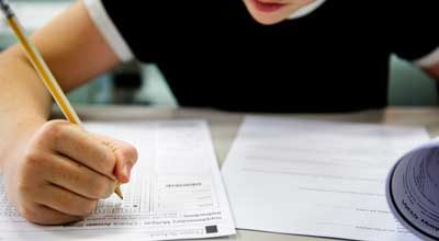 student doing the test exam 400x220 1